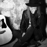 La guitariste solitaire